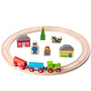Wooden train set with tracks, colorful train cars, and small buildings on a white background